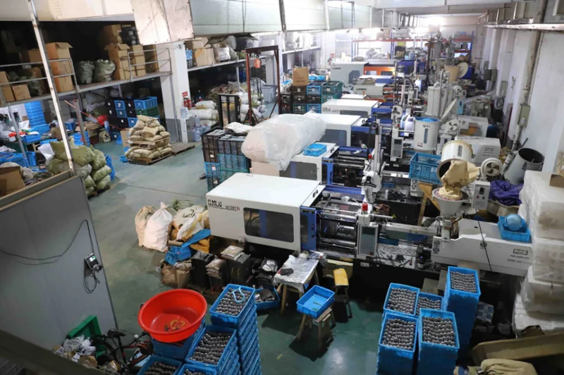 Plastic injection workshop — Haitian injection molding machines producing small components